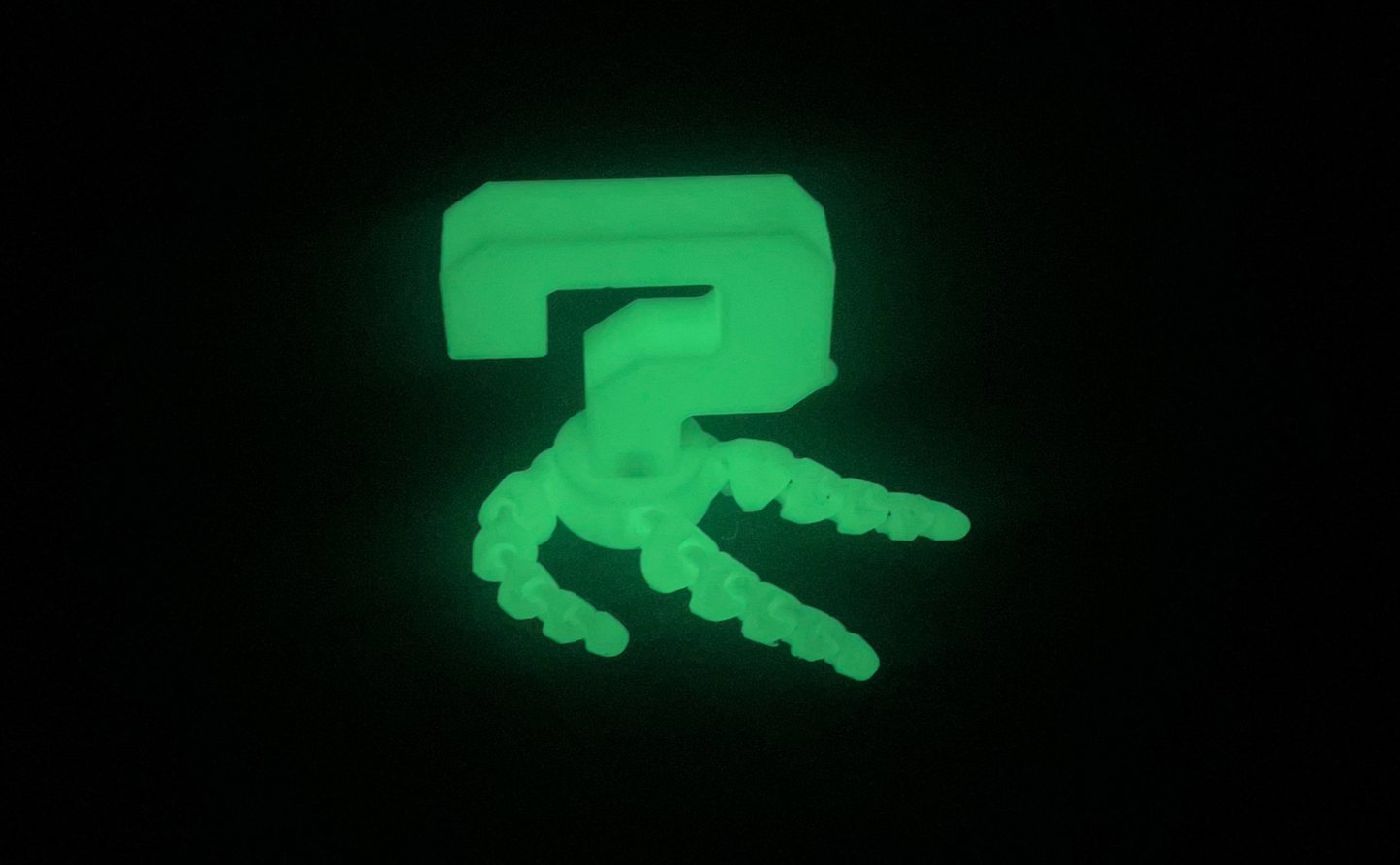 Glowing green symbol on a black background