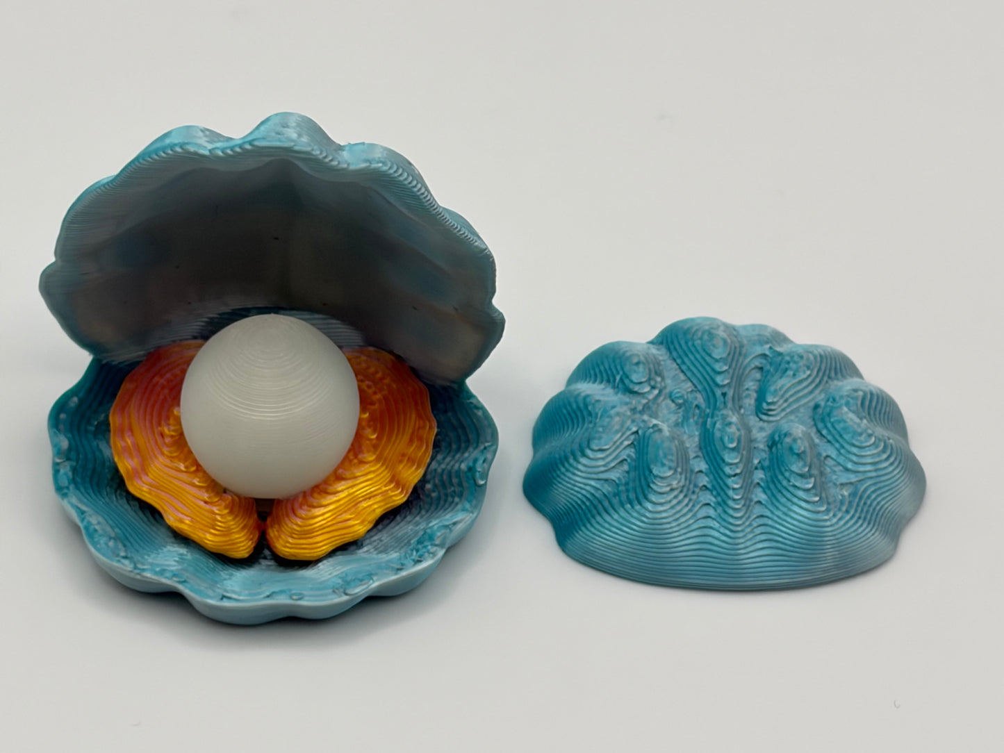 "Hatcessories" Clam w/glow Pearl